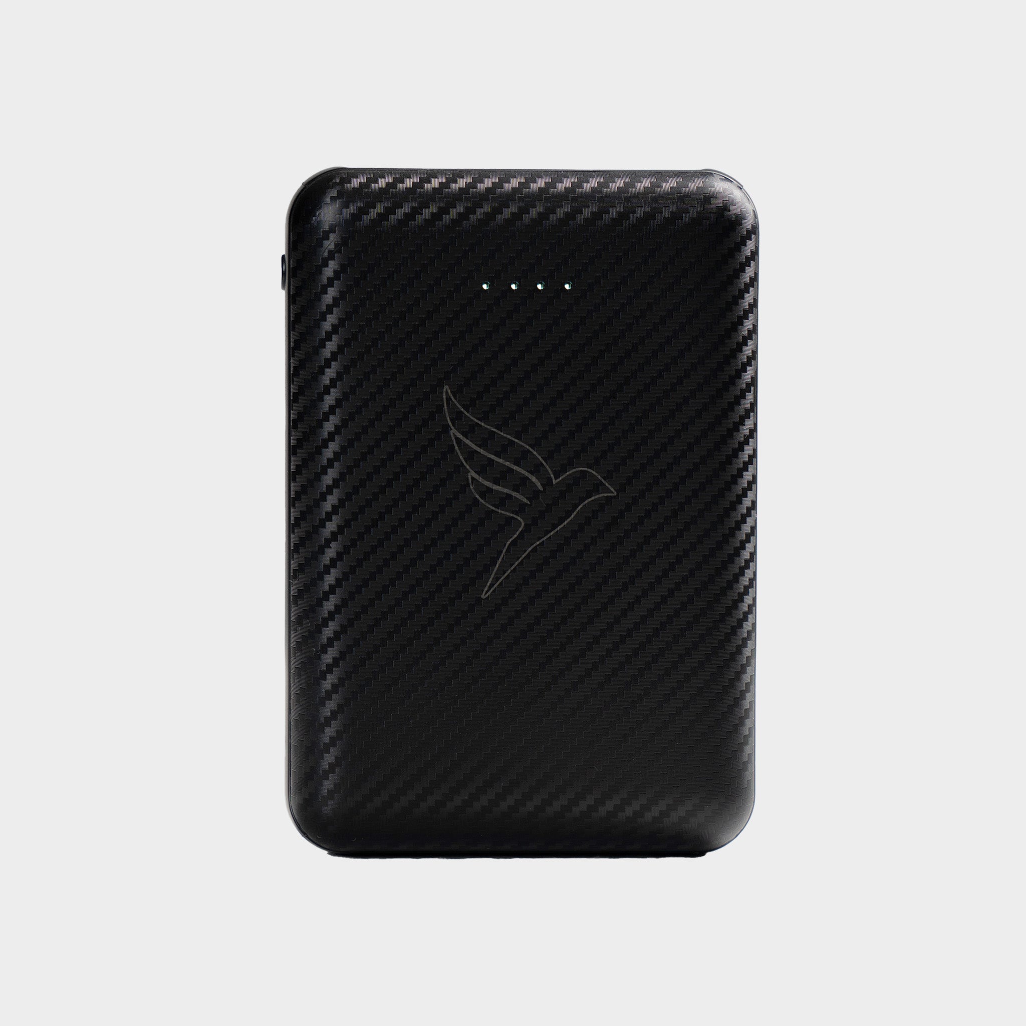 Black carbon fiber patterned Koltrast power bank on a light gray background